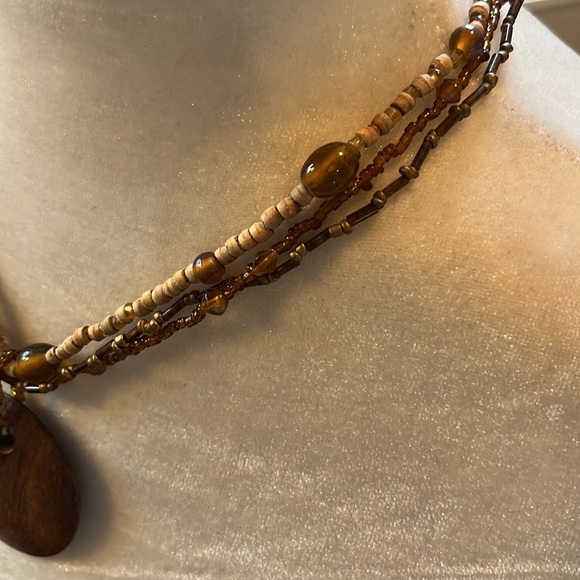 Brown beaded necklace. Worn several times. Listing #7022 - Picture 4 of 11